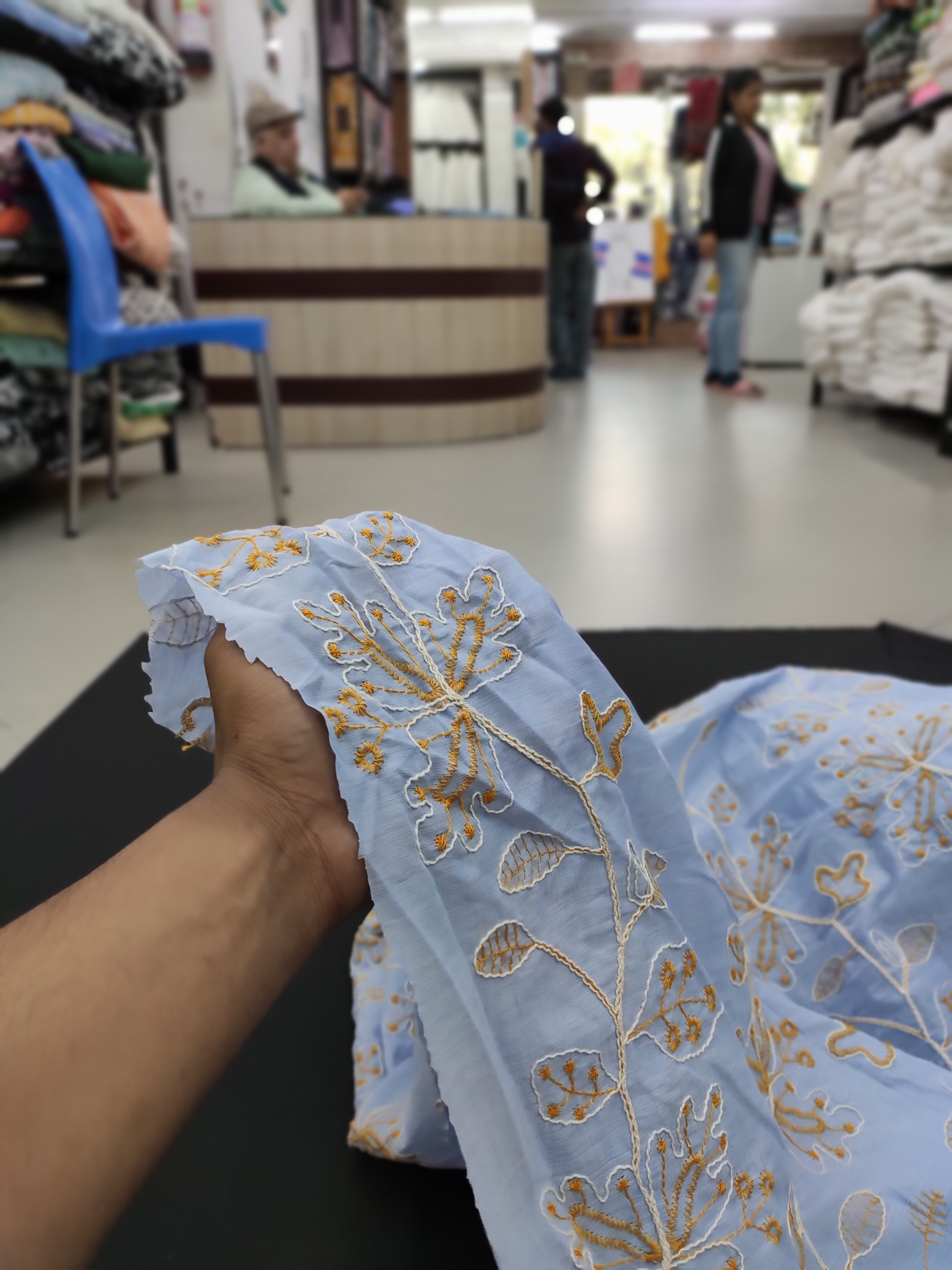 Sky Blue Cotton Fabric with Floral Yellow And White Thread Embroidery | Charu Creation