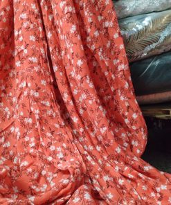 Coral Ditsy Floral Rayon Crepe Dobby Fabric | Charu Creation